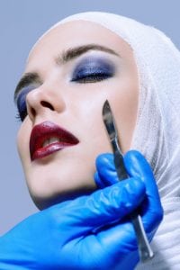 Woman Going Under The Knife For Plastic Surgery