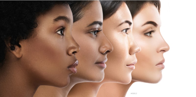 Face profiles of four woman of different ethnicities